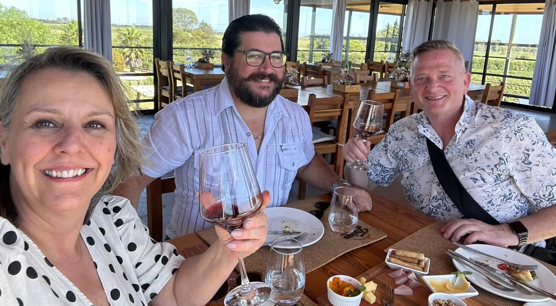 Guests enjoying a winery lunch with wine near Colonia del Sacramento, Uruguay