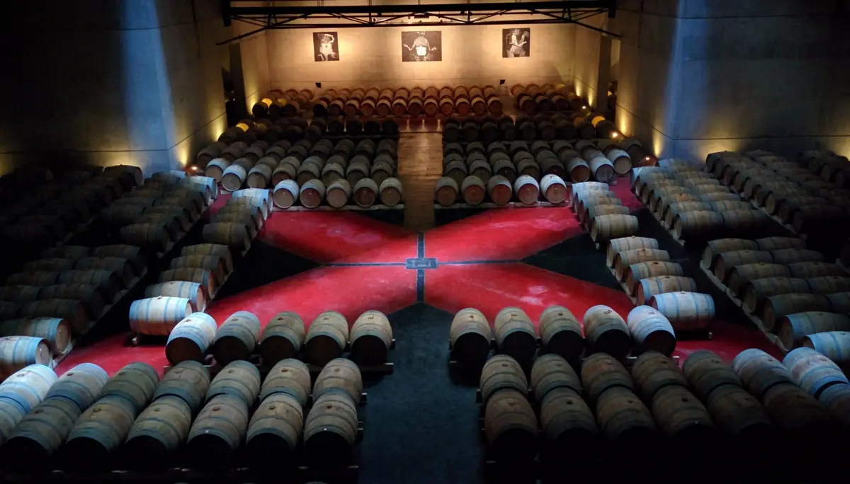 Oak barrel cellar at a winery in Luján de Cuyo, Mendoza