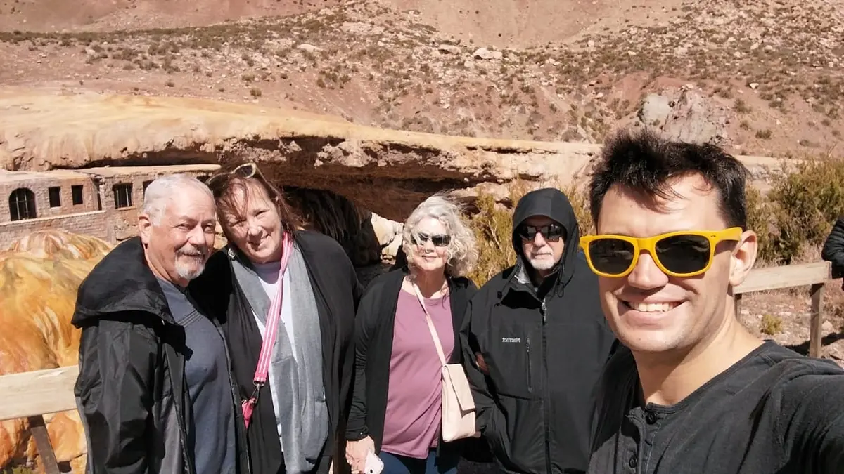 Travelers at Puente del Inca on the Andes High Mountain tour from Mendoza